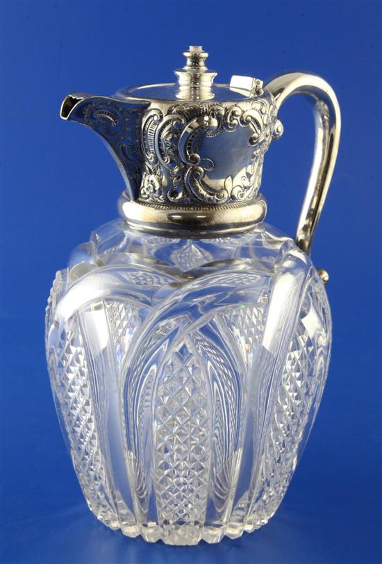 A late Victorian silver mounted cut glass claret jug, 8in.